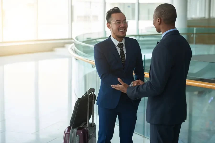 Meet and Greet at airport: agent welcomes client Meet and Greet at airport: agent welcomes client